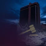 Downtown Grand Las Vegas casino tower at night with gavel and declining financial charts representing the $90M loan default and receivership
